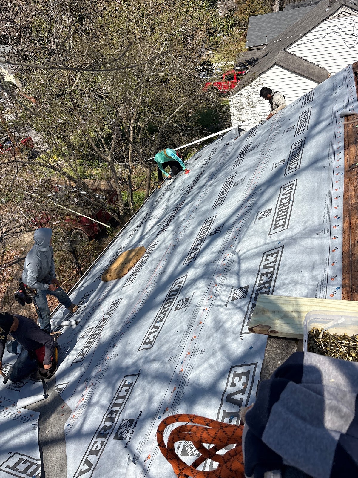 Synthetic felt dry-in, roof replacement in progress, 2026