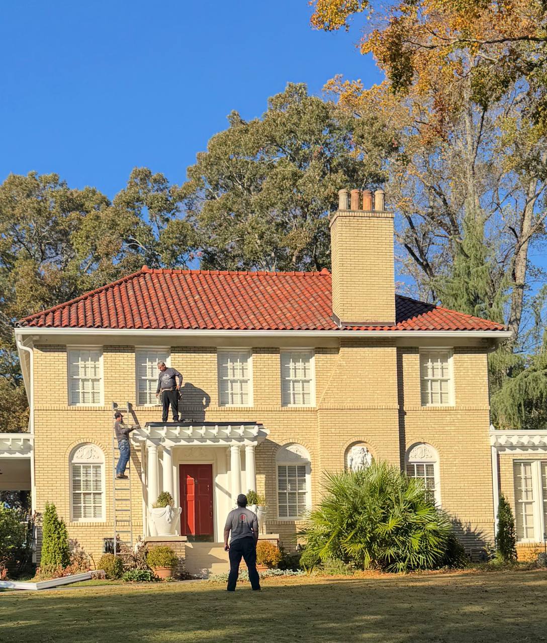 LB Roofing crew completing a tile roof installation on an Atlanta home